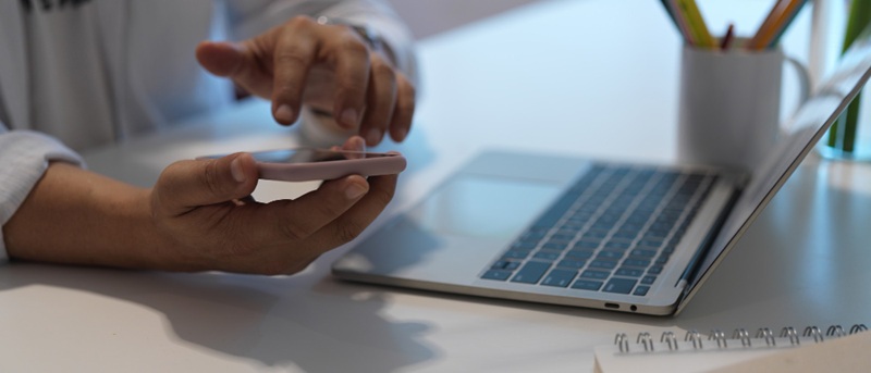 Person using a phone for MFA